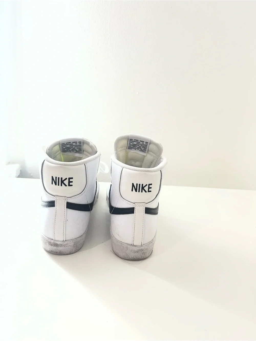 Nike Kids White High-Top Sneakers with Black Swoosh